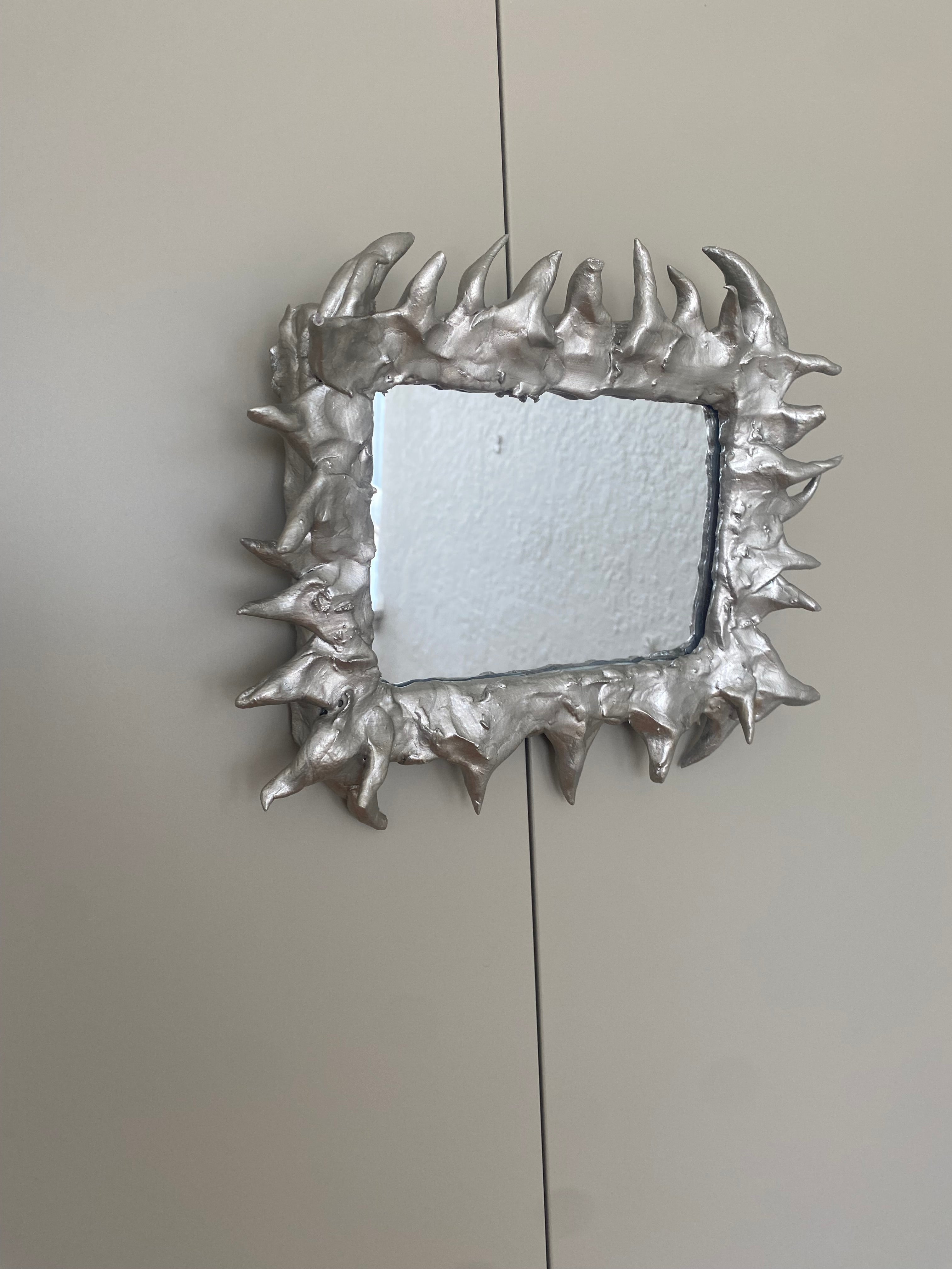 Little spikey handmade mirror